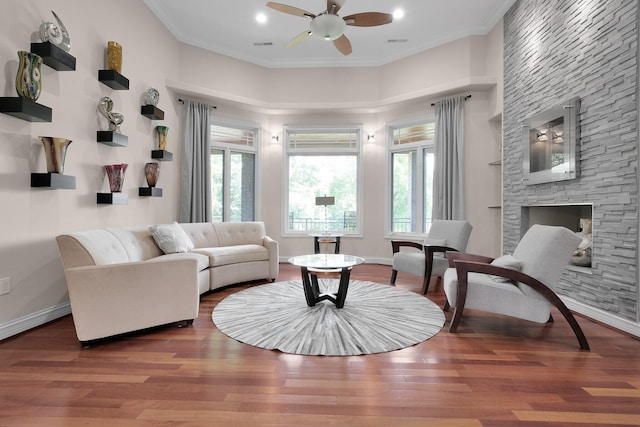 1025 Hyperion Ct, Union, KY 41091 - living room featuring a fireplace, ceiling fan, wood finished floors, crown molding, and recessed lighting