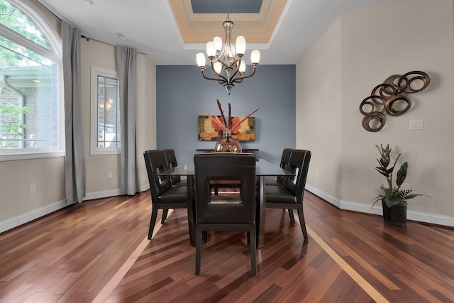 1025 Hyperion Ct, Union, KY 41091 - dining room with a chandelier, dark wood-type flooring, and a tray ceiling