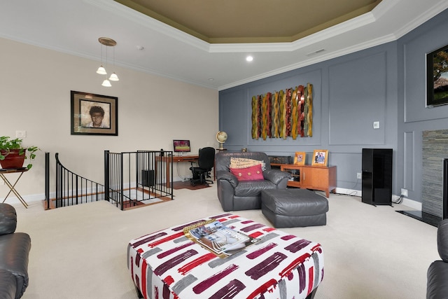 1025 Hyperion Ct, Union, KY 41091 - carpeted living area with crown molding, a tray ceiling, a fireplace with flush hearth, and recessed lighting