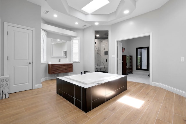 1025 Hyperion Ct, Union, KY 41091 - full bath with a marble finish shower, wood finished floors, vanity, a raised ceiling, and recessed lighting