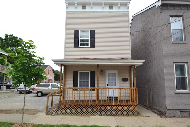 122 E 13th St, Covington, KY 41011 - italianate home with covered porch