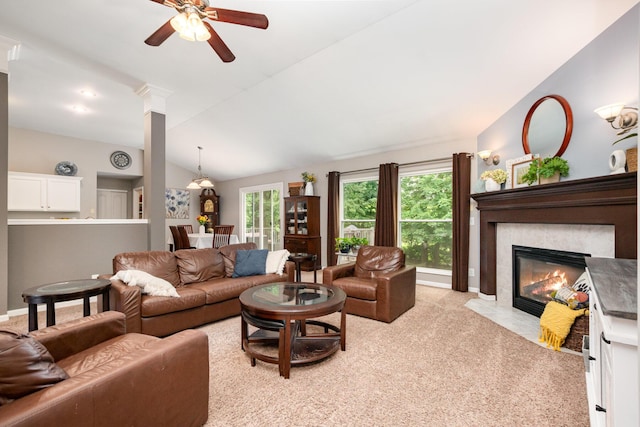 10234 Hempsteade Dr, Union, KY 41091 - living area with lofted ceiling, a ceiling fan, light carpet, and a fireplace with flush hearth