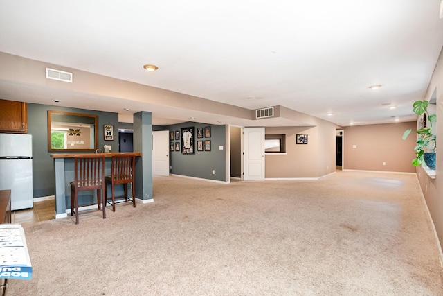 10234 Hempsteade Dr, Union, KY 41091 - unfurnished living room featuring carpet floors, bar area, and recessed lighting