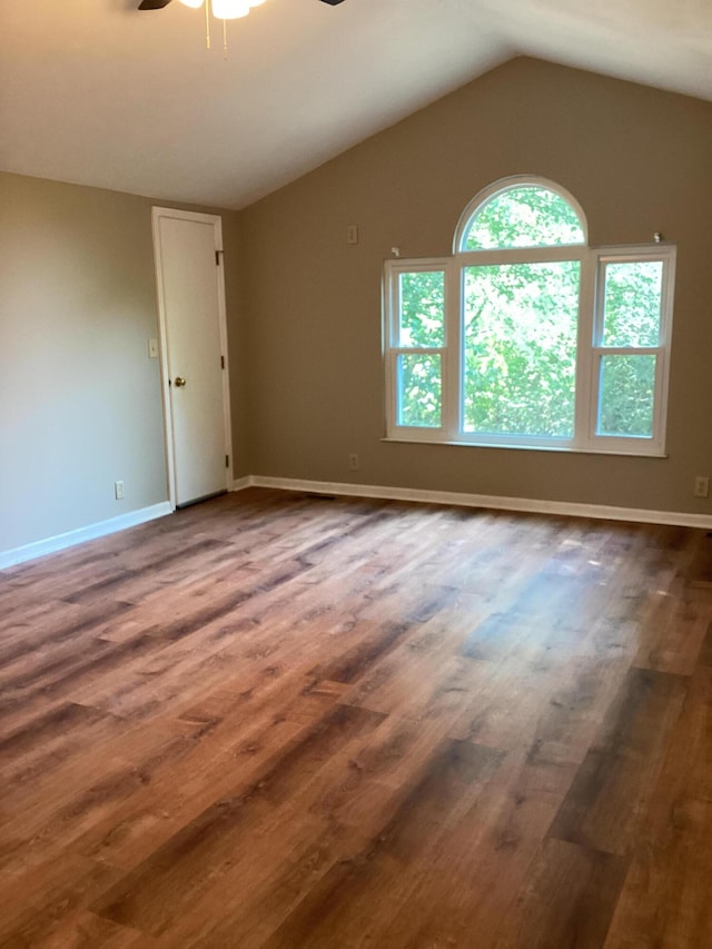 1033 Macintosh Ln, Florence, KY 41042 - empty room featuring ceiling fan, dark wood finished floors, and lofted ceiling