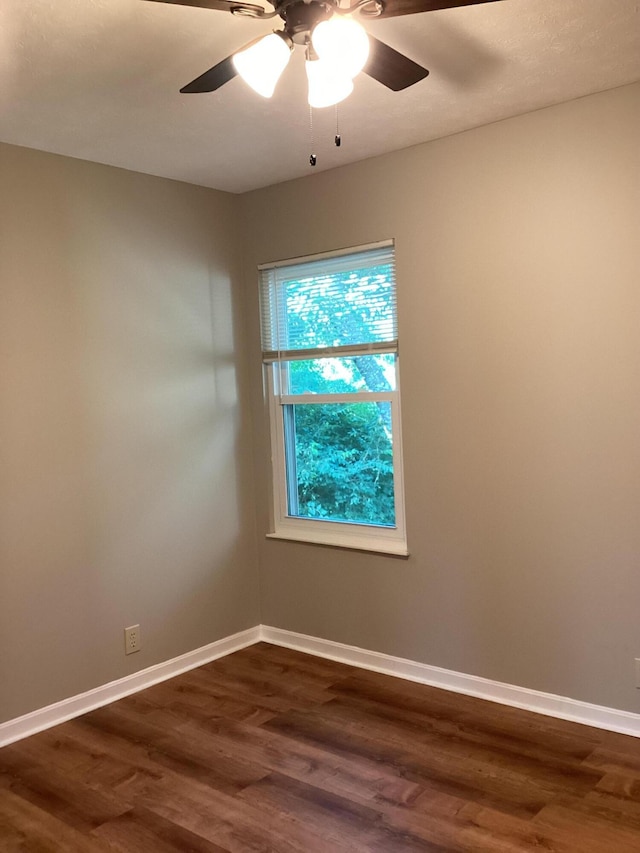 1033 Macintosh Ln, Florence, KY 41042 - empty room with dark wood finished floors and ceiling fan