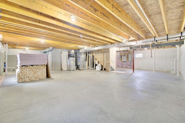 740 Norbie Dr, Burlington, KY 41005 - basement with gas water heater, heating unit, and stairs