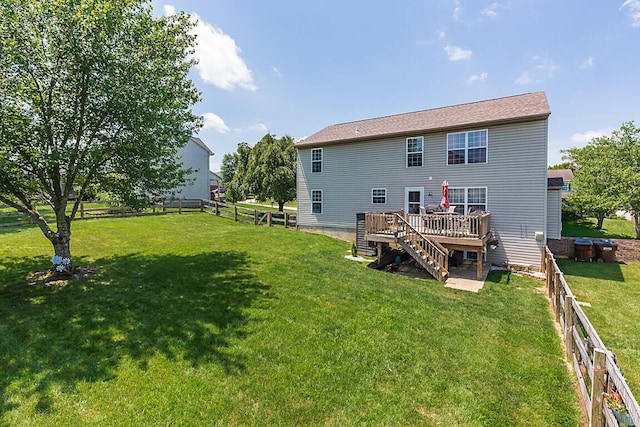 9070 Braxton Dr, Union, KY 41091 - rear view of house with a wooden deck and stairway