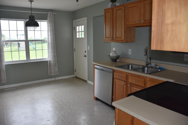 6596 Elgin Ct, Burlington, KY 41005 - kitchen with stainless steel dishwasher, light countertops, pendant lighting, range, and brown cabinetry