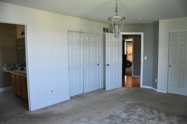 6596 Elgin Ct, Burlington, KY 41005 - unfurnished bedroom with carpet floors, a closet, and ensuite bath