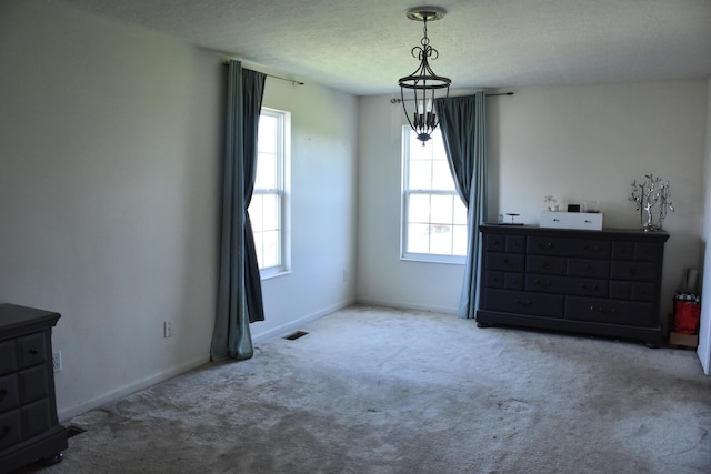 6596 Elgin Ct, Burlington, KY 41005 - unfurnished bedroom featuring carpet floors and a textured ceiling