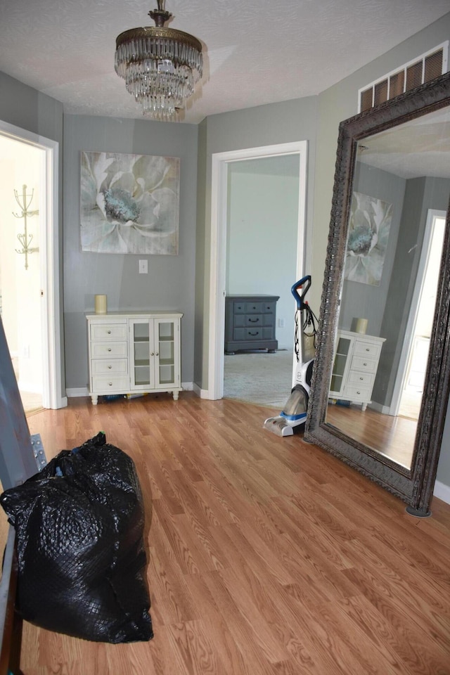 6596 Elgin Ct, Burlington, KY 41005 - interior space with wood finished floors and a chandelier