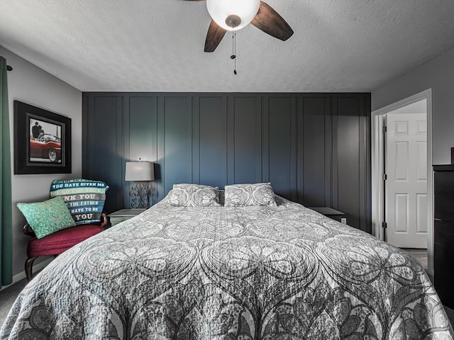 12229 Mashburn Dr, Walton, KY 41094 - carpeted bedroom with a textured ceiling and a ceiling fan