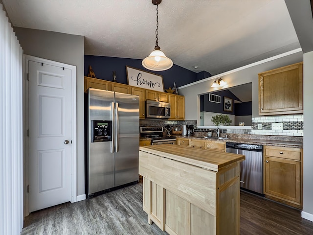 12229 Mashburn Dr, Walton, KY 41094 - kitchen with appliances with stainless steel finishes, butcher block countertops, dark wood-type flooring, and tasteful backsplash