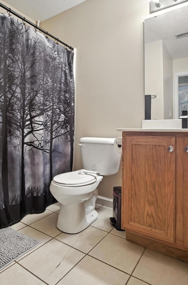 10239 Knob Hill Dr, Florence, KY 41042 - bathroom with vanity, tile patterned flooring, a textured ceiling, and a shower with curtain