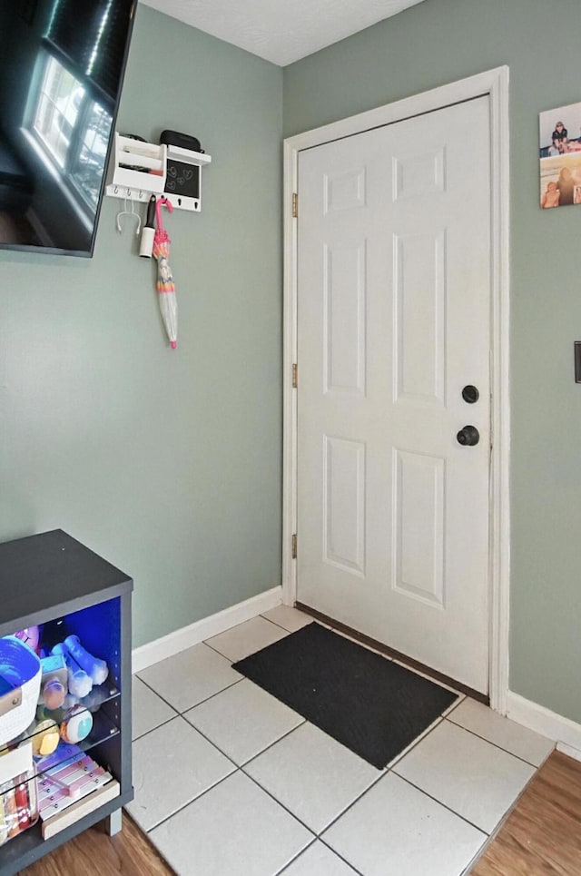 10239 Knob Hill Dr, Florence, KY 41042 - doorway with light tile patterned floors