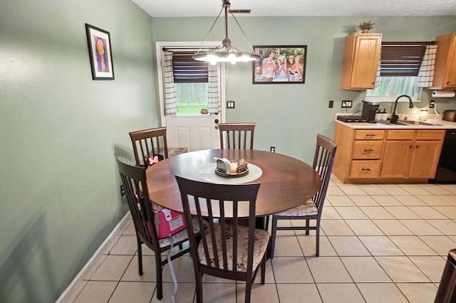 10239 Knob Hill Dr, Florence, KY 41042 - dining space with light tile patterned floors and baseboards
