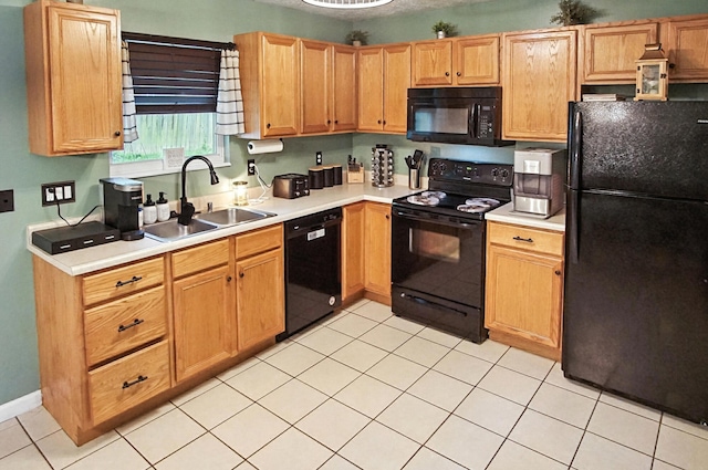 10239 Knob Hill Dr, Florence, KY 41042 - kitchen with black appliances, light countertops, and light tile patterned floors