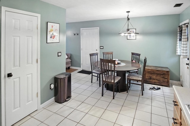 10239 Knob Hill Dr, Florence, KY 41042 - dining area with baseboards and light tile patterned floors