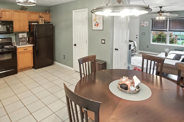 10239 Knob Hill Dr, Florence, KY 41042 - dining area with ceiling fan and light tile patterned flooring