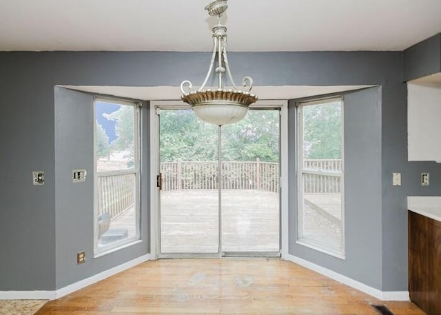 3310 Kingsburg Ct, Erlanger, KY 41018 - unfurnished dining area featuring light wood-type flooring
