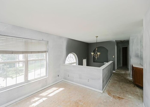 3310 Kingsburg Ct, Erlanger, KY 41018 - empty room with a chandelier and baseboards