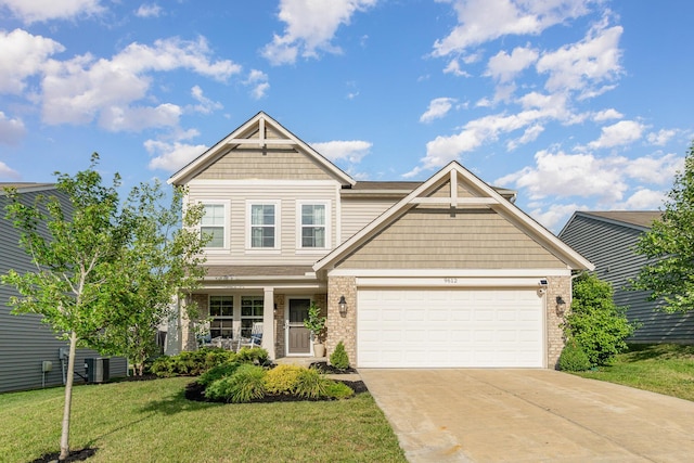 9612 Sweetwater Ln, Alexandria, KY 41001 - craftsman-style house featuring brick siding, driveway, a front lawn, and a garage