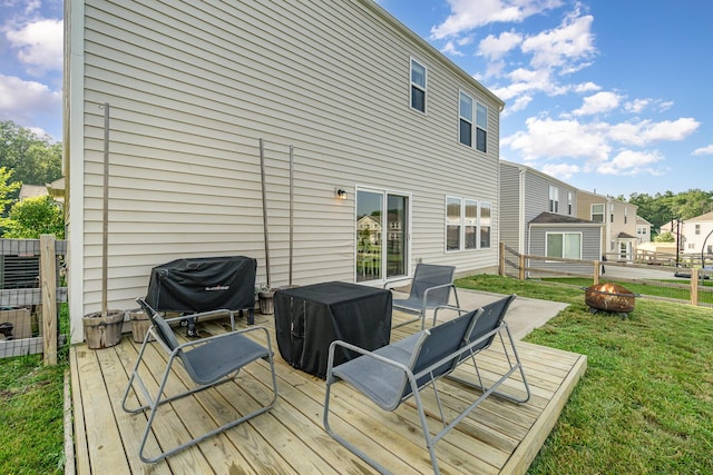 9612 Sweetwater Ln, Alexandria, KY 41001 - wooden deck featuring an outdoor fire pit, grilling area, and a lawn
