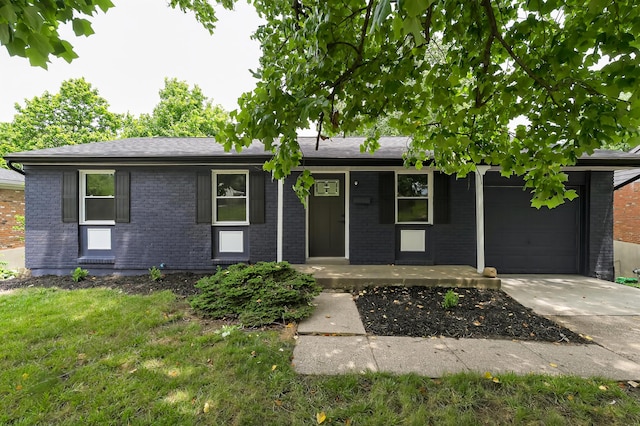 139 Berkley Dr, Florence, KY 41042 - ranch-style home featuring brick siding, an attached garage, driveway, a porch, and a front yard
