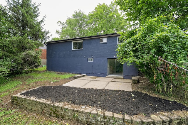 139 Berkley Dr, Florence, KY 41042 - back of house featuring a patio and brick siding