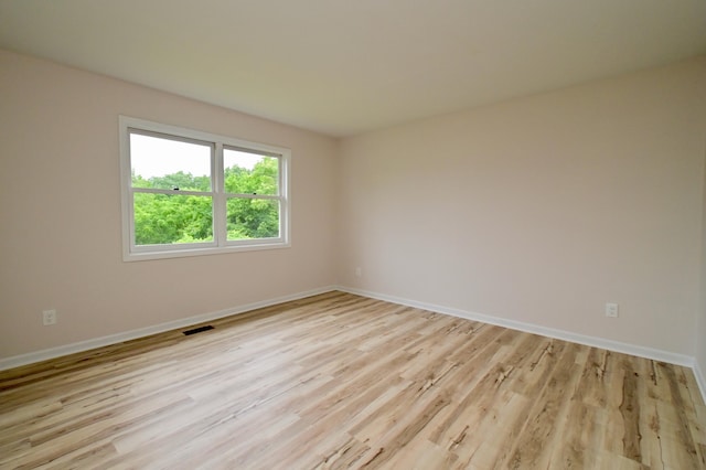 680 Manor Dr, Taylor Mill, KY 41015 - spare room featuring light wood-style floors and baseboards