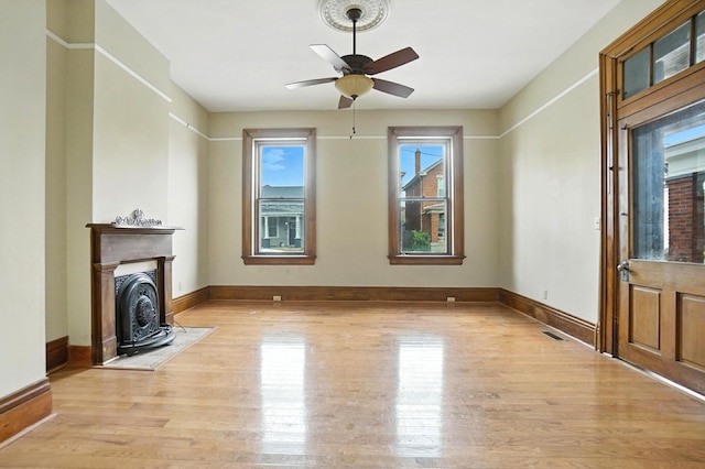 234 Walnut St, Bellevue, KY 41073 - unfurnished living room with light wood finished floors and ceiling fan