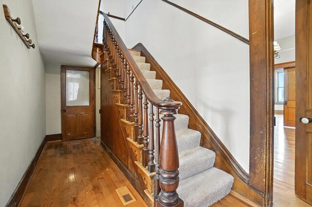 234 Walnut St, Bellevue, KY 41073 - stairway featuring hardwood / wood-style flooring and baseboards