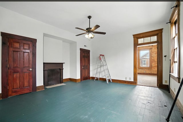 234 Walnut St, Bellevue, KY 41073 - unfurnished living room with ceiling fan, hardwood / wood-style flooring, and a fireplace with flush hearth