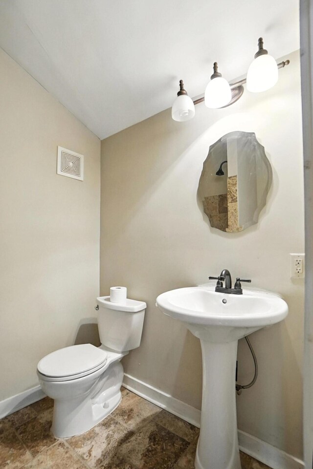 234 Walnut St, Bellevue, KY 41073 - bathroom featuring toilet and lofted ceiling