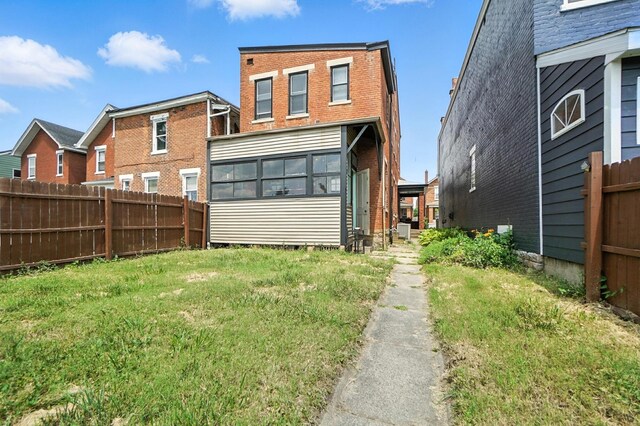 234 Walnut St, Bellevue, KY 41073 - rear view of property with brick siding