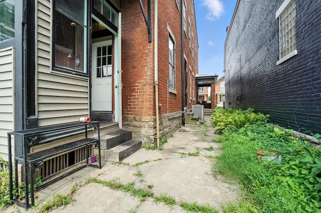 234 Walnut St, Bellevue, KY 41073 - view of property exterior featuring brick siding and entry steps