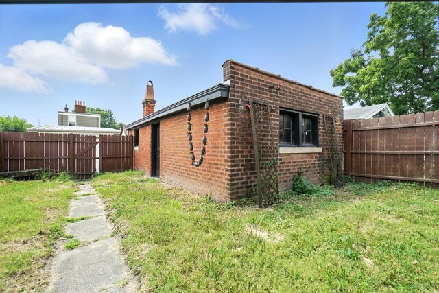 234 Walnut St, Bellevue, KY 41073 - view of side of home with brick siding and a chimney