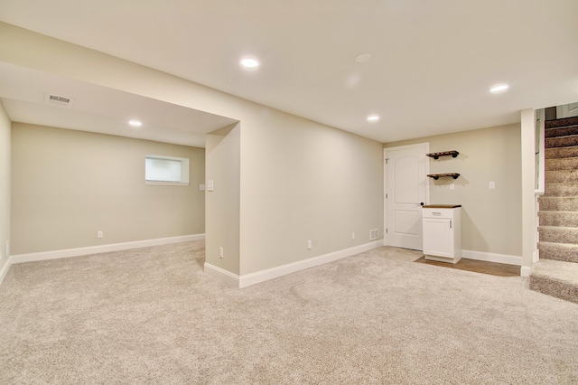 693 Peach Tree Ln, Erlanger, KY 41018 - finished below grade area with stairs, light colored carpet, and recessed lighting