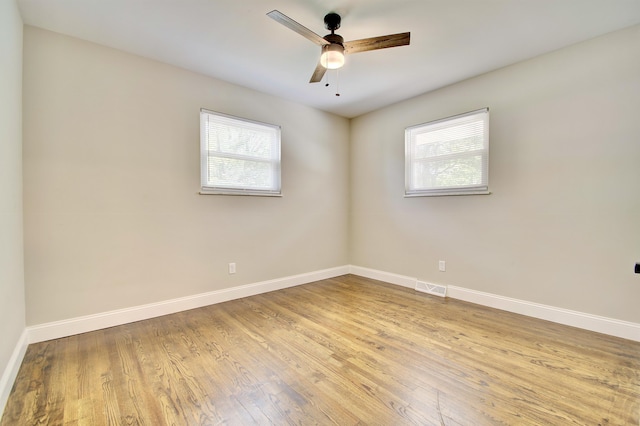 693 Peach Tree Ln, Erlanger, KY 41018 - empty room featuring wood finished floors and ceiling fan