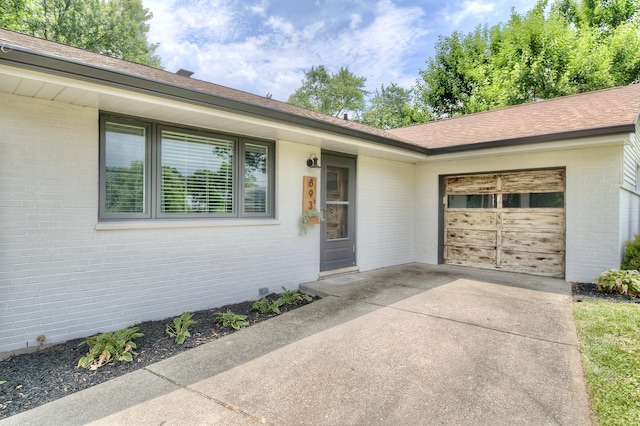 693 Peach Tree Ln, Erlanger, KY 41018 - entrance to property featuring brick siding, driveway, and an attached garage