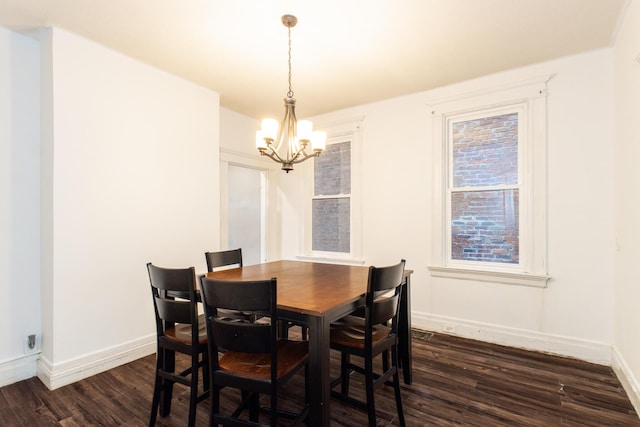 332 W 21st St, Covington, KY 41014 - dining space with dark wood-style flooring and a chandelier