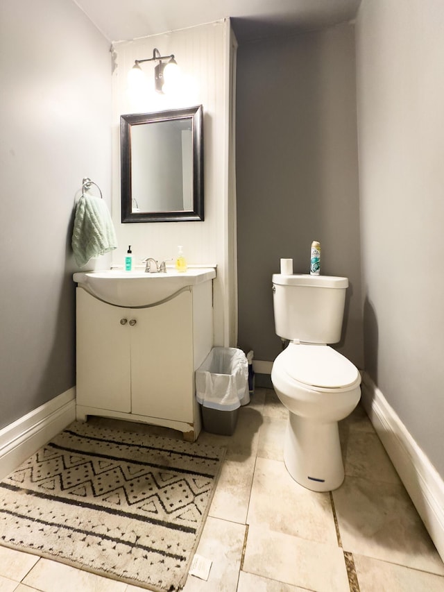 332 W 21st St, Covington, KY 41014 - half bathroom with vanity and tile patterned floors