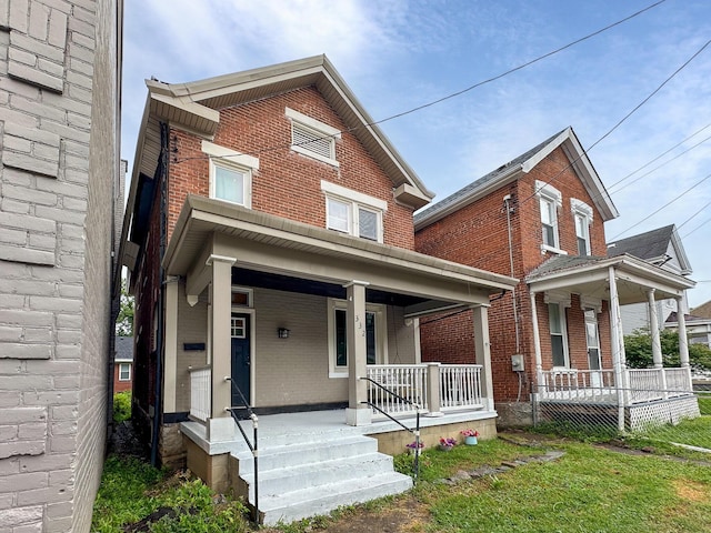 332 W 21st St, Covington, KY 41014 - traditional home featuring covered porch and brick siding
