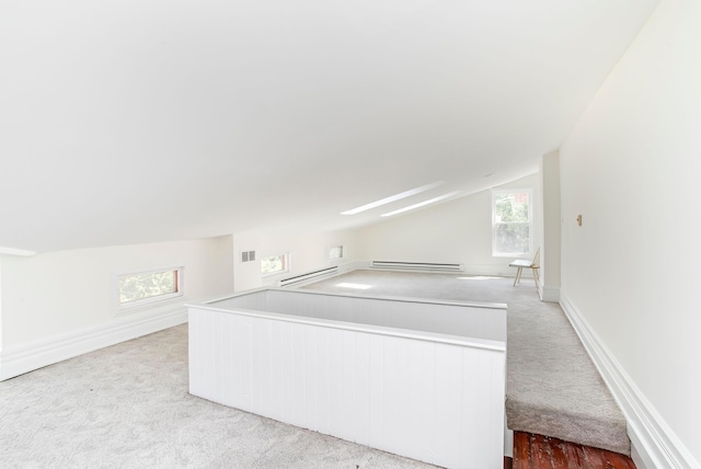 416 E 8th St, Newport, KY 41071 - bonus room with a baseboard heating unit, carpet flooring, and vaulted ceiling