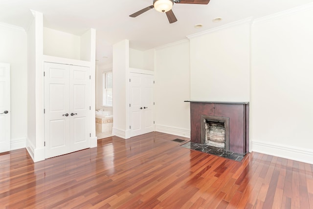 416 E 8th St, Newport, KY 41071 - unfurnished living room with wood finished floors, ceiling fan, crown molding, and a fireplace with flush hearth