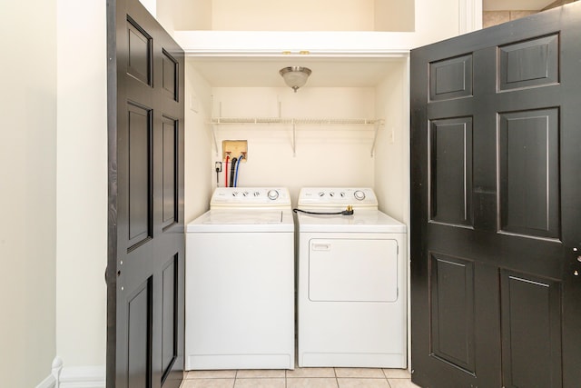 416 E 8th St, Newport, KY 41071 - washroom with washing machine and clothes dryer and light tile patterned floors