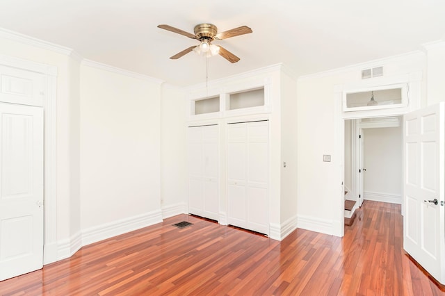 416 E 8th St, Newport, KY 41071 - unfurnished bedroom featuring light wood finished floors, crown molding, and ceiling fan