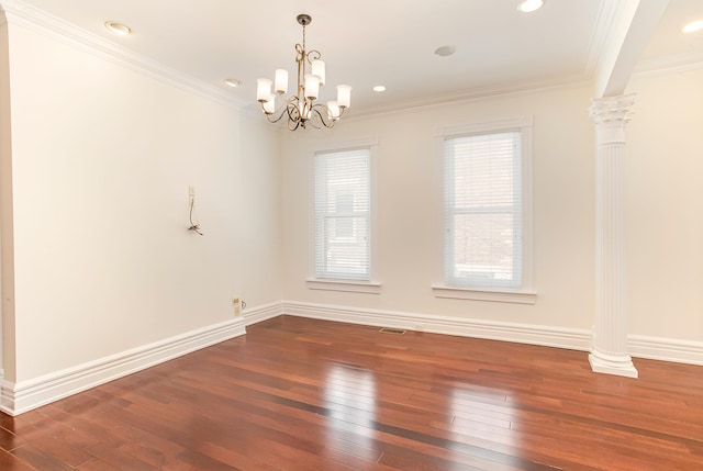 416 E 8th St, Newport, KY 41071 - spare room featuring wood-type flooring, healthy amount of natural light, ornate columns, ornamental molding, and recessed lighting