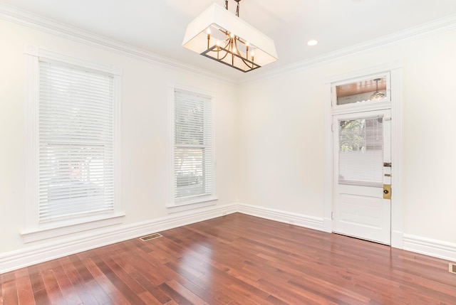 416 E 8th St, Newport, KY 41071 - unfurnished dining area featuring a chandelier, wood finished floors, and ornamental molding