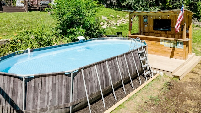 15 21st St, Newport, KY 41071 - view of swimming pool featuring a deck and a lawn